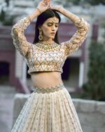 ACouture white multi lehnga.
